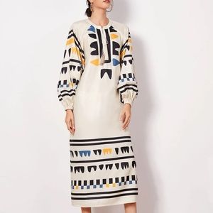 Tassel tie neck lantern sleeve geo dress Brand New